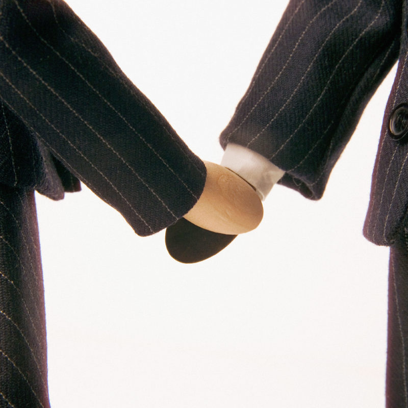 Businesspeople holding hands